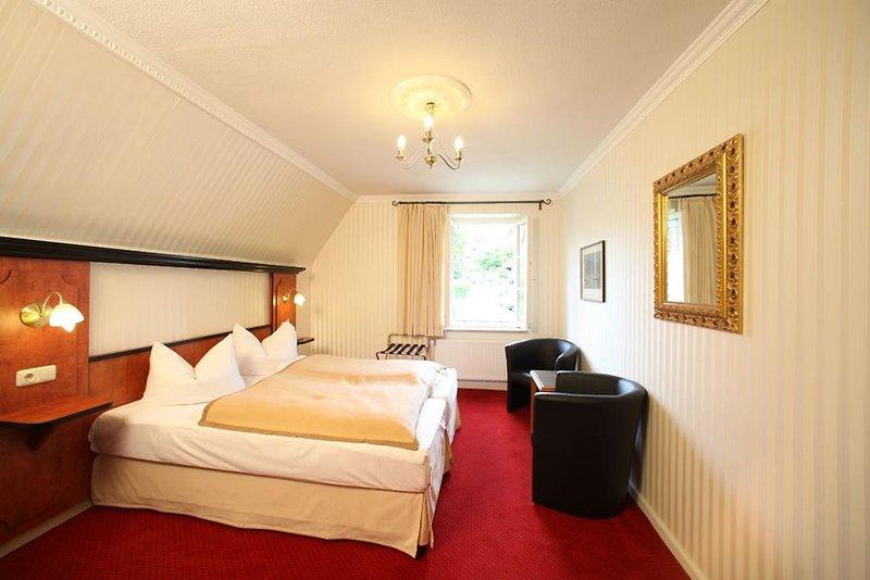 Holen Sie sich schöne Zimmer im Hotel Goldener Hirsch