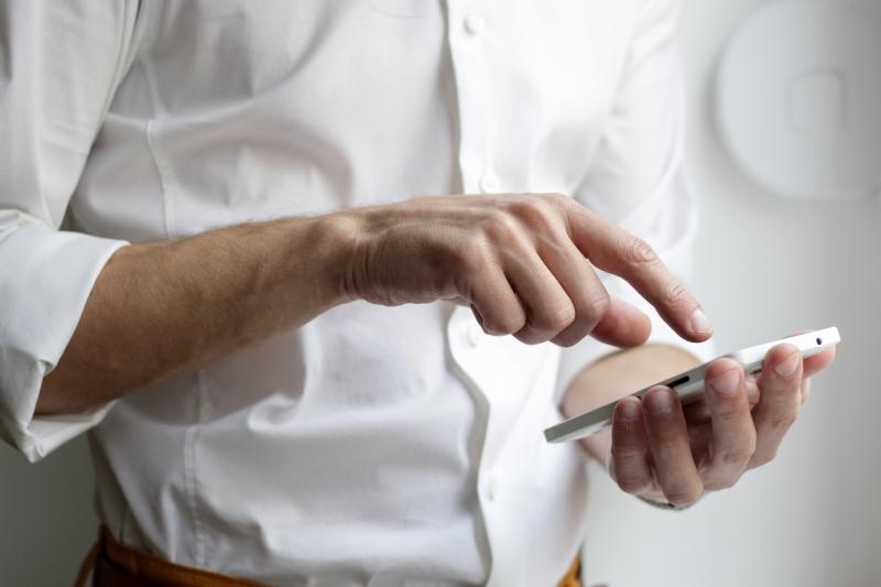 Man using his mobile phone to call