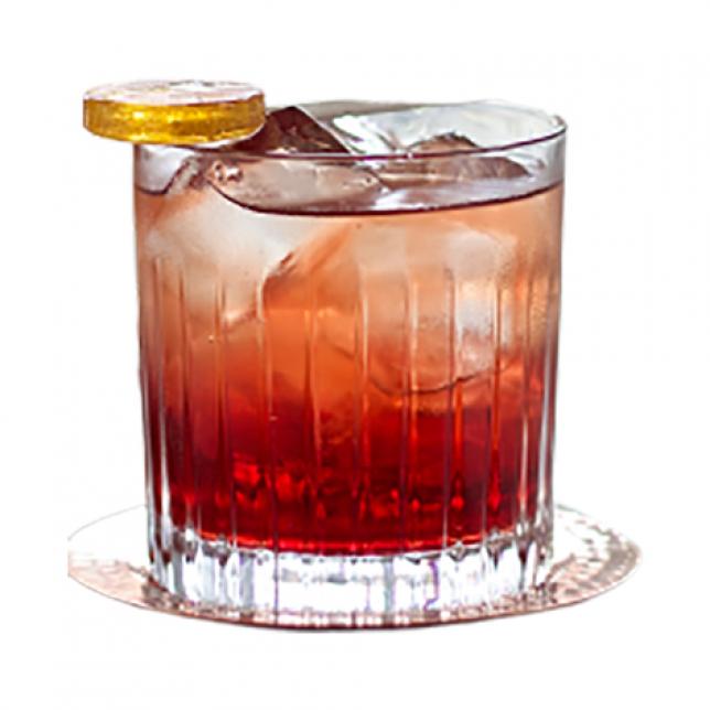 Hot Peach Rhapsody Cocktail med slikkepind