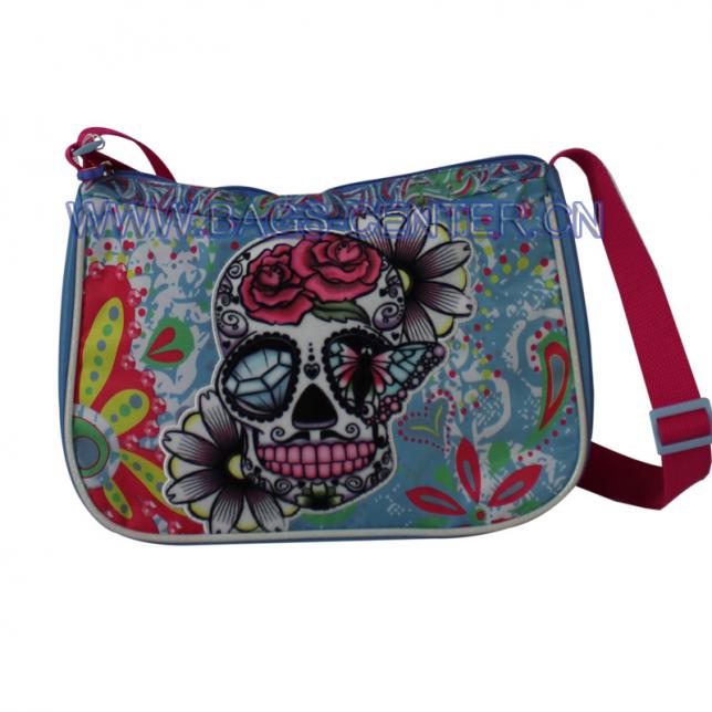 Skull collection shoulder bag. It is designed with blue twill fabric with CMYK printing. The skull is in flannelette printing with embroidery.
