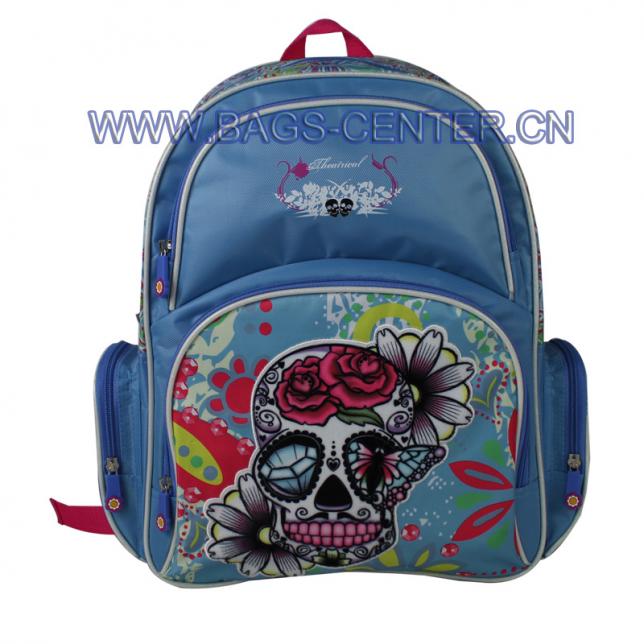 Skull collection backpack. It is designed with blue twill fabric with CMYK printing. Three compartments. The skull is in flannelette printing with embroidery.