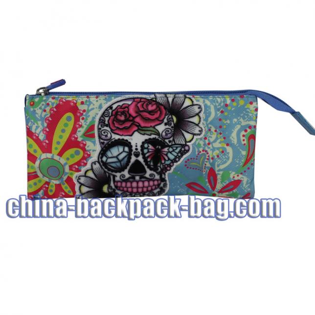 Skull collection pencil case. It is designed with blue twill fabric with CMYK printing. The skull is in flannelette printing with embroidery.