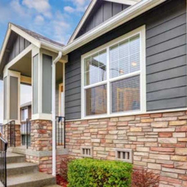 residential home with new vinyl replacement windows