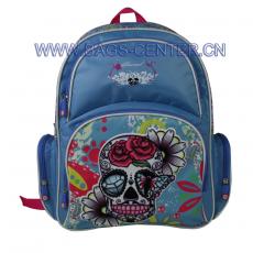Skull collection backpack. It is designed with blue twill fabric with CMYK printing. Three compartments. The skull is in flannelette printing with embroidery.